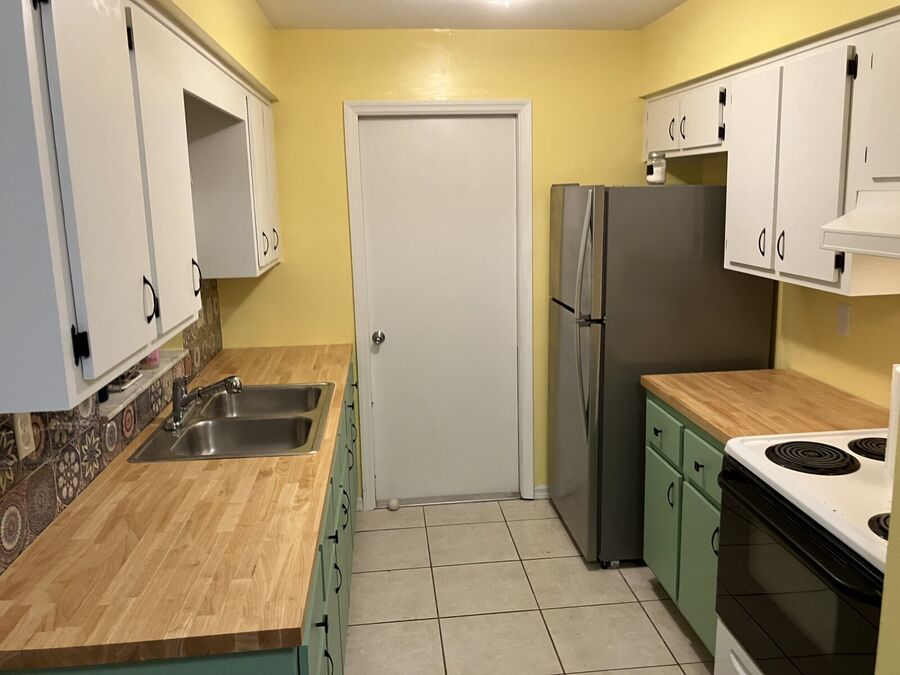 Full kitchen view after refresh — both walls complete